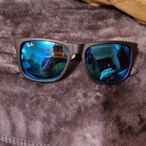 Ray-Ban Matte Black Sunglasses with Reflective Blue Lenses